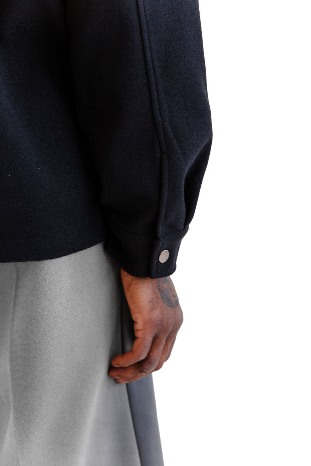 Black weighted snap shirting