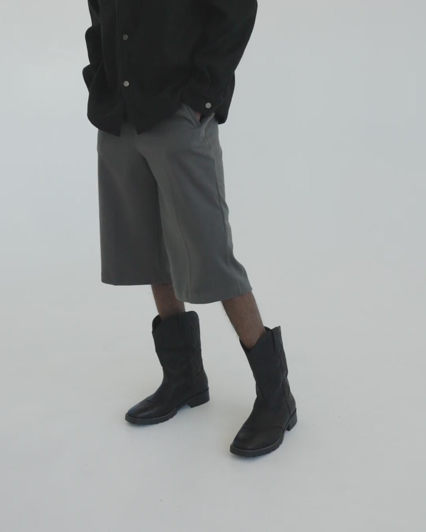 Black weighted snap shirting